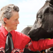 Dr.Temple Grandin with a cow