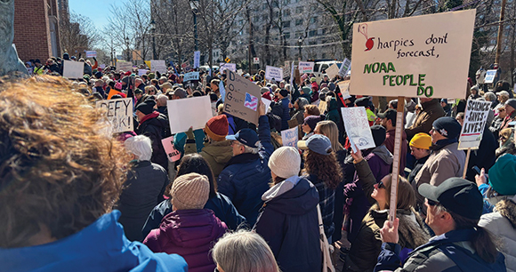 citizens rally in Washington, DC, to protest staffing and funding cuts to NOAA