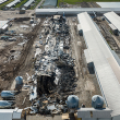 An aerial overview of the charred remains of a chicken shed destroyed by a fire. All of the nearly 120,000 hens housed inside perished.