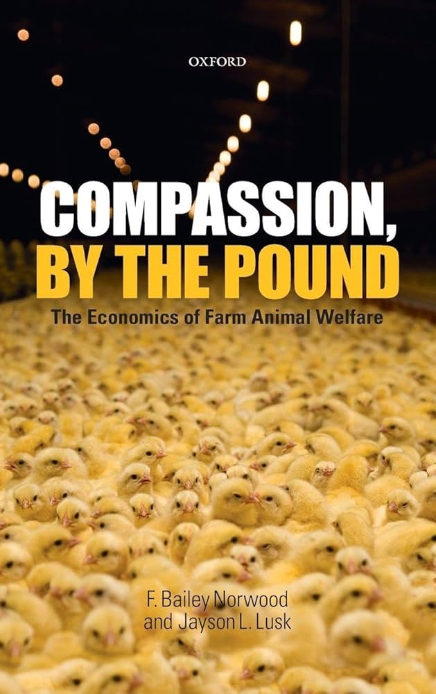 countless chicks line a factory farm floor