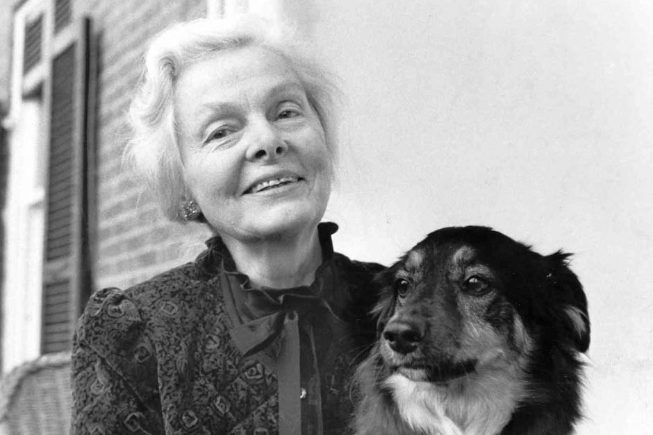 Christine Stevens, AWI founder, with one of her beloved dogs.