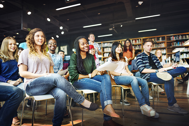 high school aged children in classroom seats looking at instructor